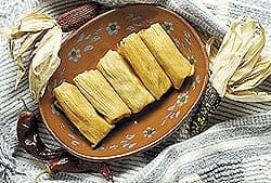 Grilled Tamales Awaiting the Cream